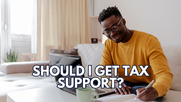 Self-employed man smiling while reviewing finances — considering tax planning support for 1099 income, bookkeeping, and long-term savings.